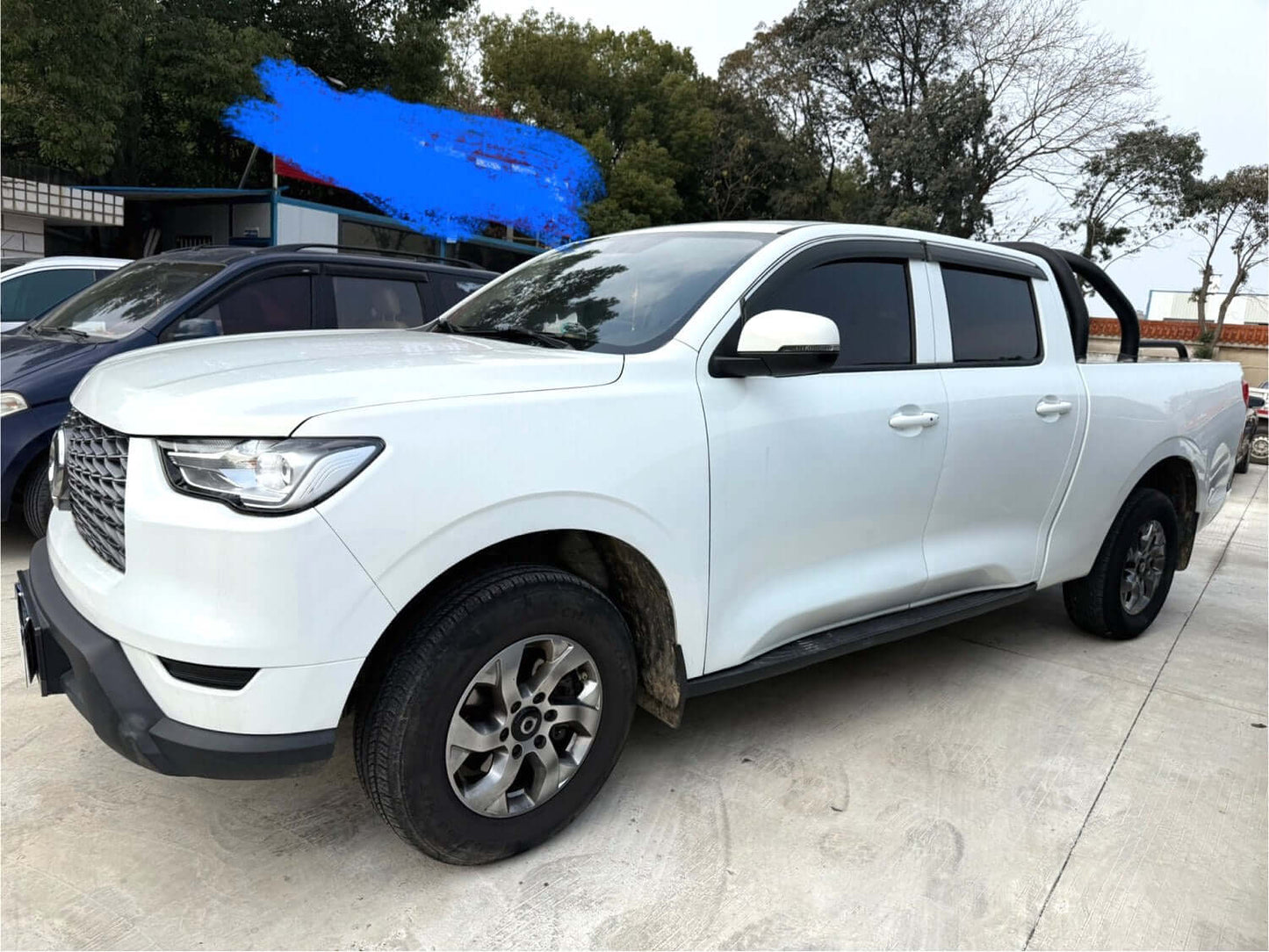 长城 2021款 炮 2.0T 商用版柴油四驱领航型长箱 手动挡