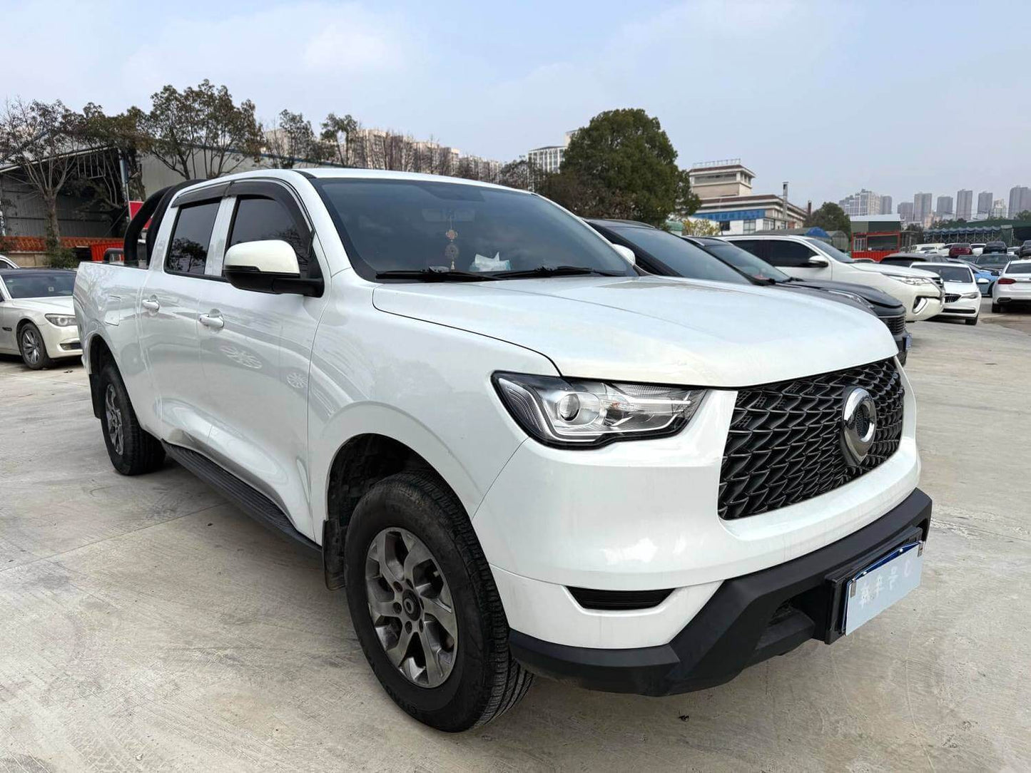 长城 2021款 炮 2.0T 商用版柴油四驱领航型长箱 手动挡